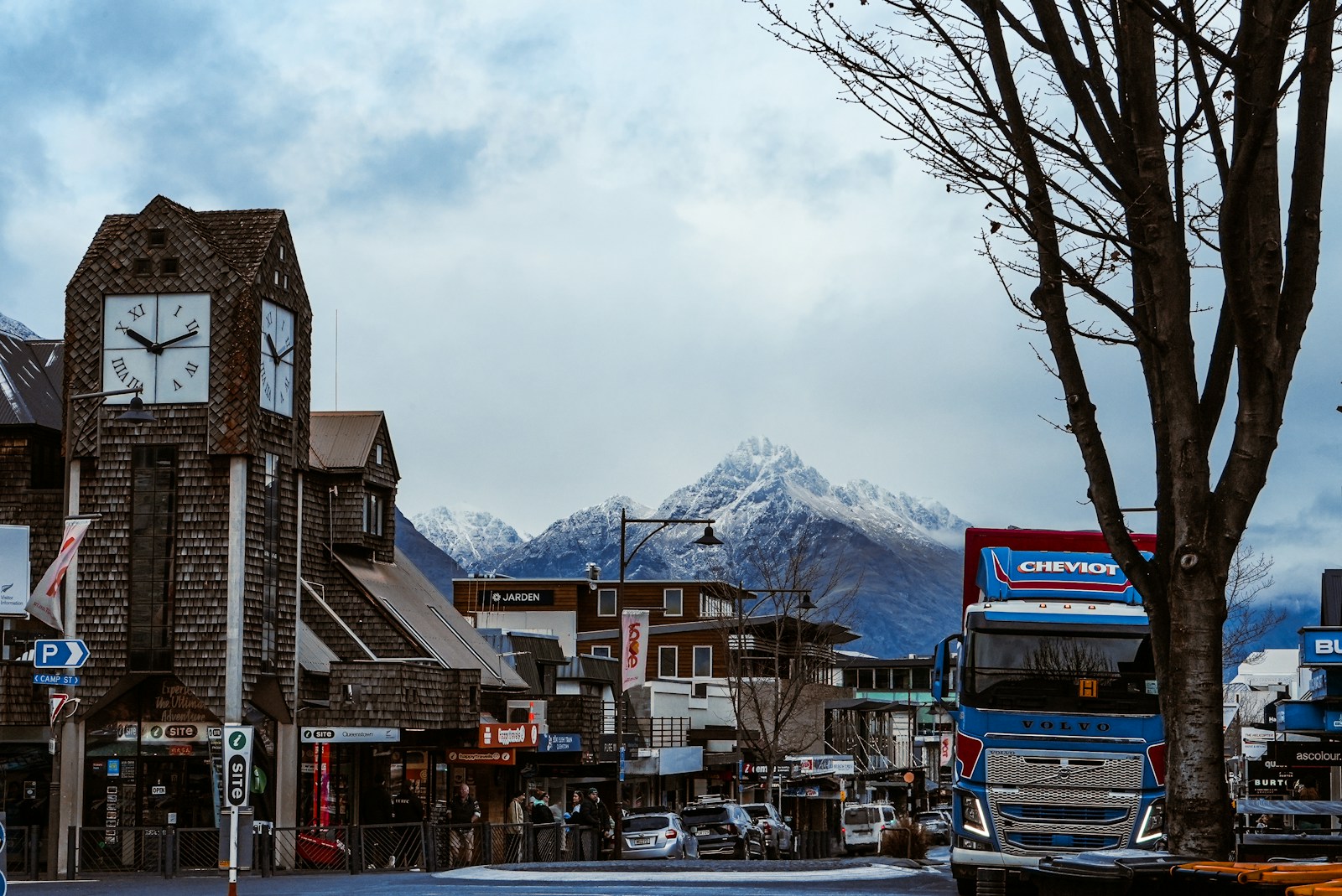 Snow-dusted Remarkables ridgeline at dusk, winter-festival season